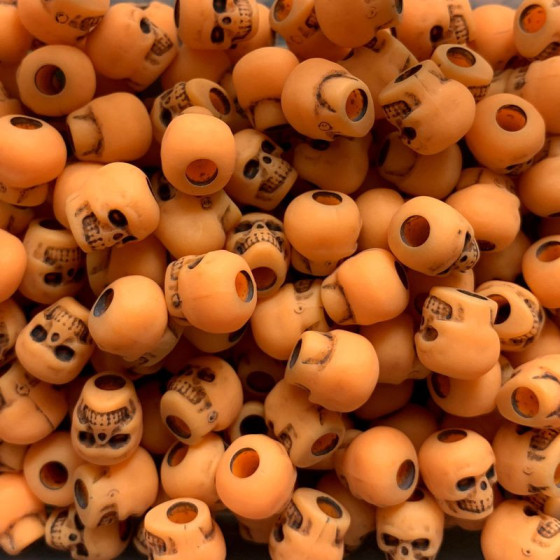 Plastic bead skull antique orange